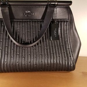 Black Quilted Handbag With Rivots